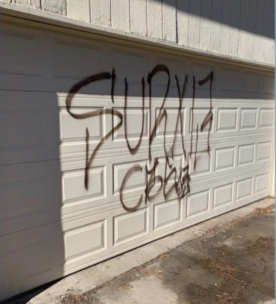 Garage door with graffiti