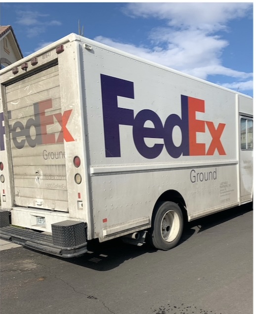 FedEx truck before washing - dirty